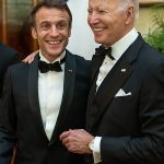 Macron and Biden in tuxedos.